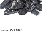 Natural wood charcoal Isolated on white. Стоковое фото, фотограф Сергей Толмачёв / Фотобанк Лори