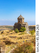 Aerial drone view of famous Vahramashen Church of the 11th century, located near destroyed Amberd fortress in sunny summer day. Cliff with Arkashian River deep in canyon. Aragatsotn region, Armenia. Стоковое фото, фотограф Алексей Ширманов / Фотобанк Лори