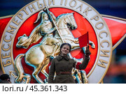 Участница театрализованной сцены на территории интерактивного музея под открытым небом на Красной площади в центре городе Москвы, Россия. Музей посвящен параду 7 ноября 1941 года. Редакционное фото, фотограф Николай Винокуров / Фотобанк Лори