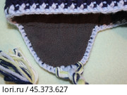 Вязаная шапка, яркая шапка, вязаные вещи, ручная работа, связано крючком, детская одежда (2017 год). Редакционное фото, фотограф Татьяна Осипова / Фотобанк Лори