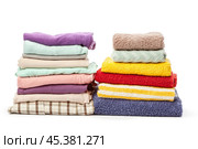 stack of clothing isolated on white. Стоковое фото, фотограф Сергей Толмачёв / Фотобанк Лори