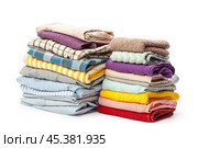 stack of clothing isolated on white. Стоковое фото, фотограф Сергей Толмачёв / Фотобанк Лори