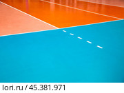 White lines of border professional volleyball court in sport gym, sporty background. Photo of orange volleyball courts, no one. Team game success, healthy sporty lifestyle concept. Copy ad text space. Стоковое фото, фотограф Aleksandr Golubev / Фотобанк Лори