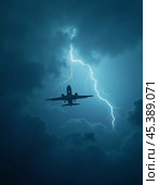 The aircraft encounters a severe thunderstorm, surrounded by dark clouds and illuminated by bright lightning strikes, highlighting the danger in the sky. Causes of air crashes. Generative AI. Стоковое AI-изображение, AI-художник Юлия Петровская / Фотобанк Лори