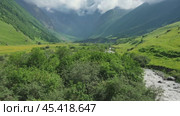Stream and valley in Caucasus mountains. Стоковое видео, видеограф Михаил Коханчиков / Фотобанк Лори
