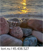 Sunset on a pebble beach - on the Black Sea coast in Kobuleti, Georgia. Стоковое фото, фотограф IRYNA ZAKHARANKA / Фотобанк Лори