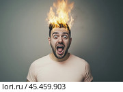 Man's hair is on fire. Стоковое AI-изображение, AI-художник Дмитрий Киселёв / Фотобанк Лори