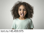 Little girl with a little pill on her tongue. Стоковое AI-изображение, AI-художник Дмитрий Киселёв / Фотобанк Лори