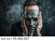 Man covers his face with a copper mask. Стоковое AI-изображение, AI-художник Дмитрий Киселёв / Фотобанк Лори