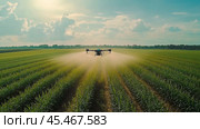 An industrial drone flies over a green field and sprays useful pesticides to increase productivity and destroys harmful insects. Modern technologies in agriculture. Стоковое AI-изображение, AI-художник Ирина Ручушкина / Фотобанк Лори