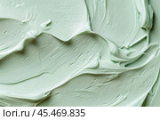 Green cream texture background. Body lotion swipe swatch. Skincare mask. Cosmetic face serum smudge. Moisturizer smooth smear. Trendy bio selfcare beauty product. Peptides, ceramide, retinol. Eco Clay. Стоковое AI-изображение, AI-художник Евгений Демидюк / Фотобанк Лори
