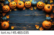 Festive card with carved pumpkins and autumn leaves on a rustic wooden table during Thanksgiving season. Стоковое AI-изображение, AI-художник Людмила Лесовая / Фотобанк Лори