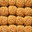 Appetizing hot fresh homemade gingerbread cookies on parchment in baking tray. Delicious handmade festive treat for tea. Culinary recipe. Edible background. Top view, close-up, flat lay. Стоковое фото, фотограф Виктория Катьянова / Фотобанк Лори