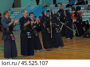 Nizhny Novgorod, Russia, 11.24.2024 Gagarin Avenue 25 d Russian Kendo Championship. Athletes in protective equipment with a sword and a protective helmet at competitions. Редакционное фото, фотограф Egor Sarantstv / Фотобанк Лори