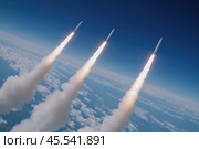 A group of starting missiles in the blue sky above the clouds. Стоковое AI-изображение, AI-художник Евгений Харитонов / Фотобанк Лори