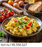 Омлет на завтрак с зеленью и вишней. утренний завтрак. легкий завтрак . scrambled eggs for breakfast with herbs and cherry. morning breakfast. light breakfast. Стоковое AI-изображение, AI-художник Artykris99 / Фотобанк Лори