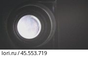 Old projector lens. Стоковое видео, видеограф Михаил Коханчиков / Фотобанк Лори