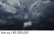Lot of lightning during a thunderstorm. Storm clouds are moving fast. Стоковое видео, видеограф Михаил Коханчиков / Фотобанк Лори