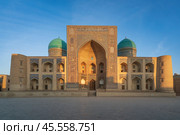 Islamic Educational and Spiritual-educational building of the Miri Arab Madrasah on a sunny day, Bukhara, Uzbekistan. Стоковое фото, фотограф Ula Ulachka / Фотобанк Лори