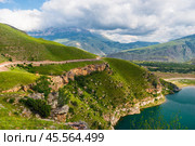 Picturesque view with steep cliffs on the mountain lake Gizhgit with azure water. Caucasus. Стоковое фото, фотограф Константин Лабунский / Фотобанк Лори