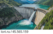 Water dam releasing overflow into turquoise river, aerial view. Стоковое AI-видео, аниматор Юрий Поздников / Фотобанк Лори