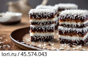 Close-up of vegan lamingtons, traditional Australian dessert. Стоковое AI-изображение, AI-художник Ирина Старикова / Фотобанк Лори