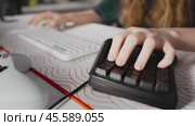 Discover ultimate home gaming studio: high-tech accessories, keypad, furniture for gamer, and ambient lighting for comfort and focus. Perfect for gaming and professional tasks. Стоковое видео, видеограф Енваев Андрей / Фотобанк Лори