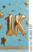 Celebration with golden balloons marking achievement of 1K on a festive backdrop. Стоковое AI-изображение, AI-художник Юлия Гапеенко / Фотобанк Лори