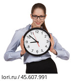 Woman in glasses holding big clock. Стоковое фото, фотограф Дмитрий Киселёв / Фотобанк Лори