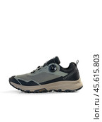 KRASNOYARSK, RUSSIA - December 1, 2024: Beige Merrell sneakers on a white background. Редакционное фото, фотограф Плотников Дмитрий / Фотобанк Лори