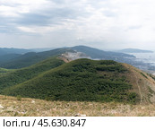 Panoramic view of Novorossiysk City and Tsemess Bay at sunrise. Morning cityscape of large port at Black Sea coast in Russia (2024 год). Стоковое фото, фотограф Фотограф / Фотобанк Лори