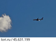 Самолет авиакомпании AnadoluJet в небе. Пендик, Стамбул, Турция. Редакционное фото, фотограф Вадим Хомяков / Фотобанк Лори