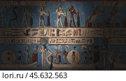 Hieroglyphic carvings and paintings on wall. Стоковое видео, видеограф Михаил Коханчиков / Фотобанк Лори