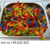 Counter with caterpillar-shaped candies. Стоковое фото, фотограф Irina Opachevsky / Фотобанк Лори
