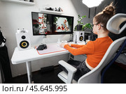 Modern technologies expand artistic creativity: AI and neural networks revolutionize workflows, enabling designers generate stunning images. Showcasing innovation, creativity, and cozy holiday vibes. Стоковое фото, фотограф Енваев Андрей / Фотобанк Лори