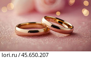 Gold wedding rings on a pink background with a side. Wedding rings. The wedding day. The newlyweds. Стоковое AI-изображение, AI-художник Photojuli / Фотобанк Лори