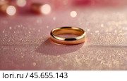 Gold wedding rings on a pink background with a side. Wedding rings. The wedding day. The newlyweds. Стоковое AI-изображение, AI-художник Photojuli / Фотобанк Лори