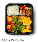 Bento box filled with rice, teriyaki chicken, and fresh vegetables. Стоковое AI-изображение, AI-художник Иван Рябоконь / Фотобанк Лори