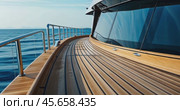 deck of a luxury modern teak yacht close-up against the sea. Стоковое AI-видео, аниматор Александр Довянский / Фотобанк Лори