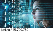 Young Caucasian female IT specialist looking at a digital board with binary program code. Data analysis, matrix numbers and artificial intelligence technology. Стоковое AI-видео, аниматор Александр Довянский / Фотобанк Лори