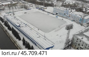 Стадион Родина в городе Кирове зимой - съемка с дрона в 2021 году. Стоковое видео, видеограф Владислав Самошкин / Фотобанк Лори