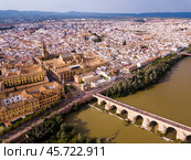 Cordoba with Roman Bridge over the Guadalquivir and the Mosque-Cathedral. Стоковое фото, фотограф Яков Филимонов / Фотобанк Лори