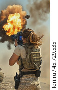War photographer capturing dramatic explosion in desert battlefield. Стоковое AI-видео, аниматор Юрий Поздников / Фотобанк Лори