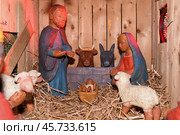 Wooden Christmas nativity scene Creche with Joseph Mary, Jesus and magi. Стоковое фото, фотограф Irina Kuchugurina/Gaudy / Фотобанк Лори