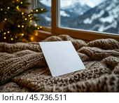A clean sheet of paper for text (note, congratulations) lies on a warm woolen plaid. Стоковое AI-изображение, AI-художник Сергей Елизарьев / Фотобанк Лори