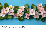 Floral arrangement featuring delicate pink flowers on a light background. Стоковое AI-изображение, AI-художник Юлия Гапеенко / Фотобанк Лори