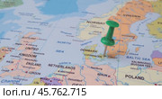 Denmark - Travel concept with green pushpin on the world map. The location point on the map points to Copenhagen the capital of the Denmark. Стоковое видео, видеограф Андрей Армягов / Фотобанк Лори