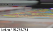 Modern Digital Large format UV printer. Printing production technologies. UV pinning is the process of applying a dose of low intensity ultraviolet light to a UV curable ink. Стоковое видео, видеограф Андрей Армягов / Фотобанк Лори