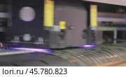 Modern Digital Large format UV printer. Printing production technologies. UV pinning is the process of applying a dose of low intensity ultraviolet light to a UV curable ink. Стоковое видео, видеограф Андрей Армягов / Фотобанк Лори