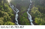 Latefossen is one of the most visited waterfalls in Norway and is located near Skare and Odda in the region Hordaland, Norway. Consists of two separate streams flowing down from the lake Lotevatnet. (2019 год). Стоковое видео, видеограф Андрей Армягов / Фотобанк Лори